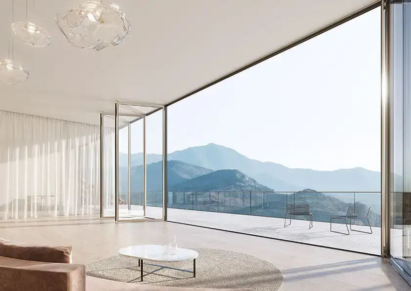 Open glass folding wall onto a sunny terrace